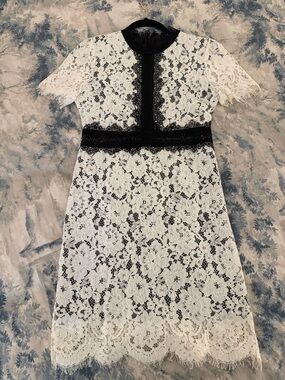 White Lace Midi Dress with Black Trim